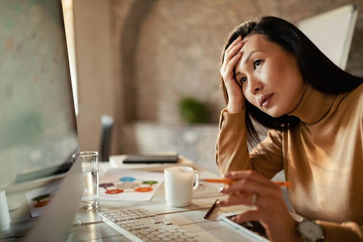 A lady unable to focus at work