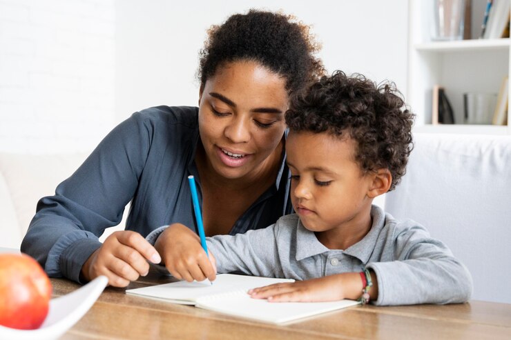 Mother helps child with homework