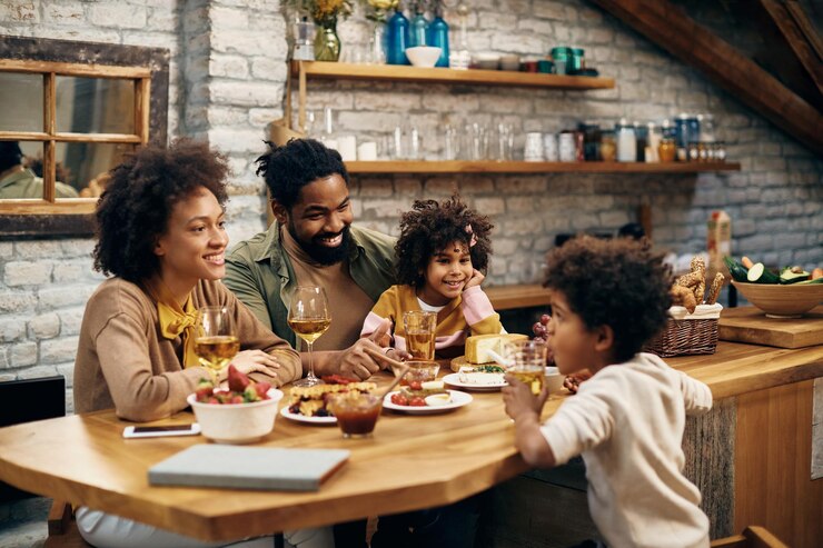 A family happily having dinner together