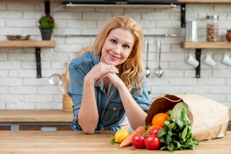 European woman with a bag of fruits and vegetables