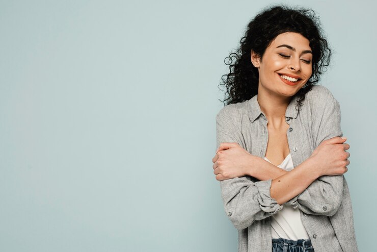 A woman hugging herself