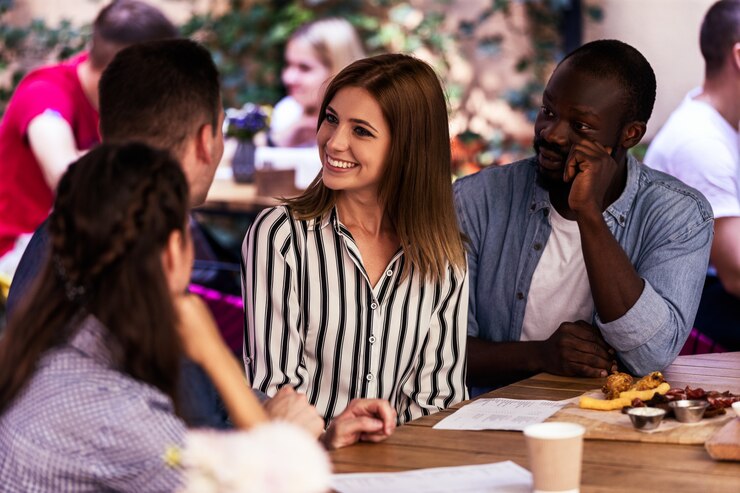 friends sitting around a table catching up