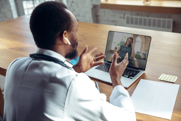 A lady receiving medical help online