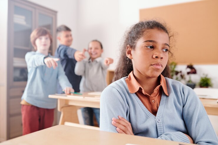 a mixed-race child being bullied by her classmates