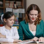 a student being taught how to say certain words