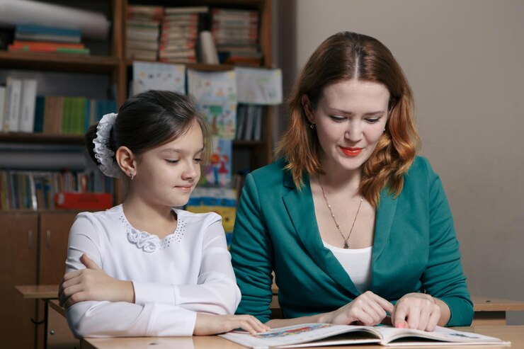 a student being taught how to say certain words