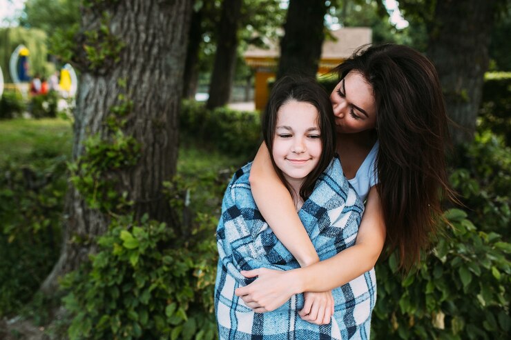 mother hugging her child