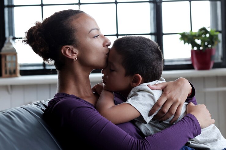 mother hugging her son